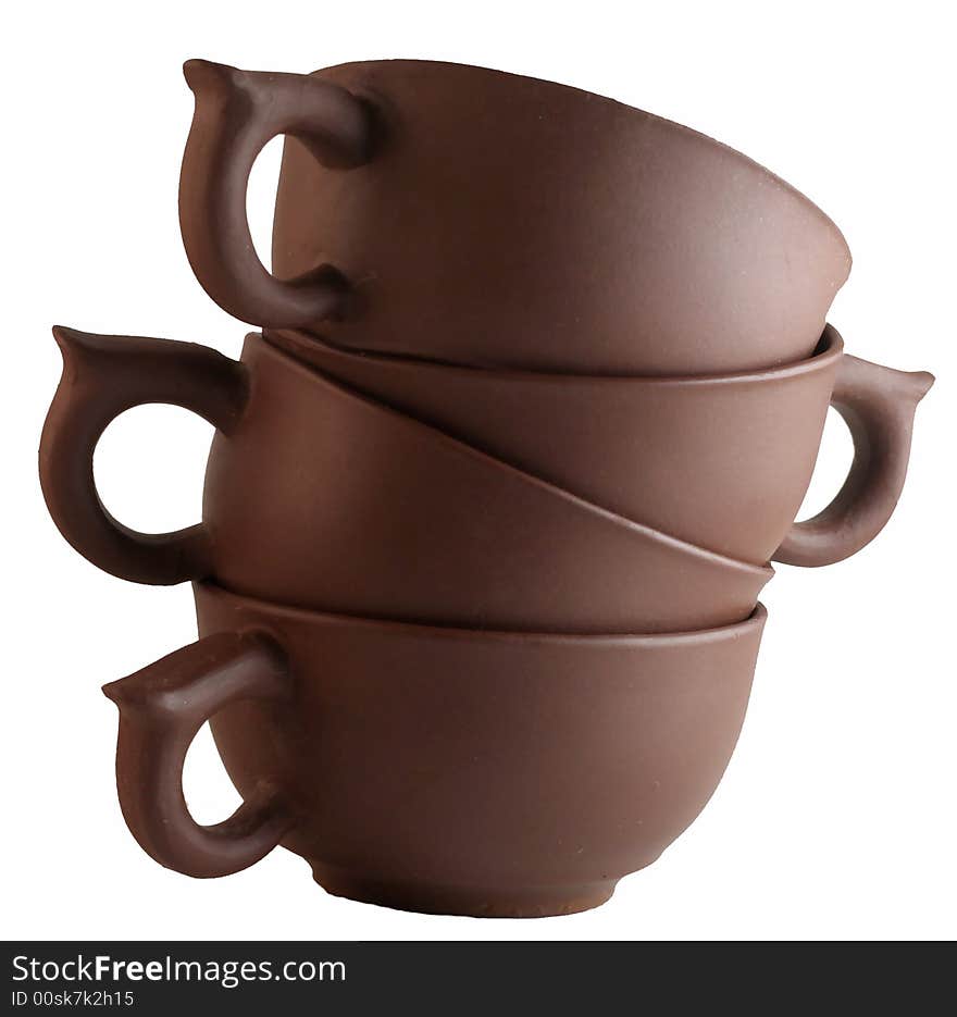 Four cups one on another against a white background. Four cups one on another against a white background