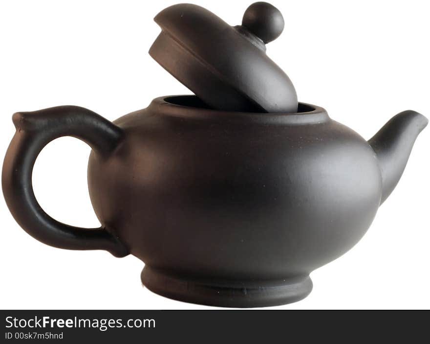 Isolated black teapot against a white background