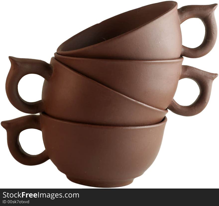 Four cups one on another against a white background. Four cups one on another against a white background