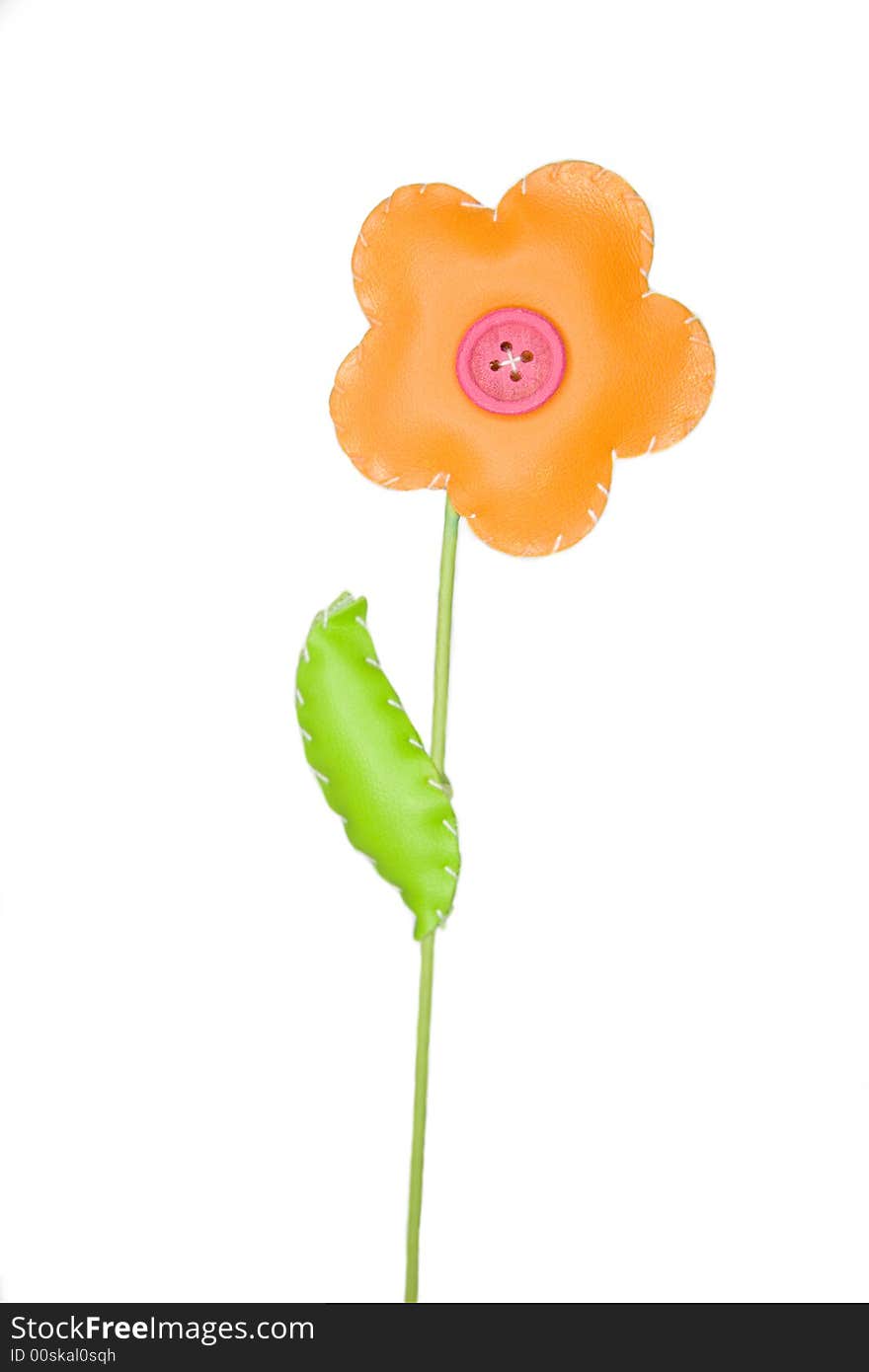 Orange toy flowers  isolated on white