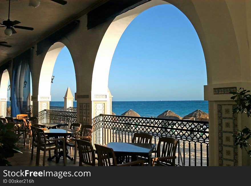 Looking through the open arcade in a summer day. Looking through the open arcade in a summer day