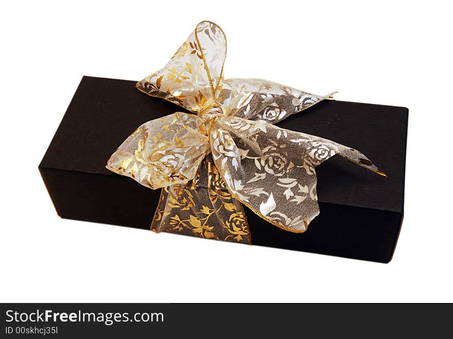 Black Gift Box with Gold Ribbon against White background