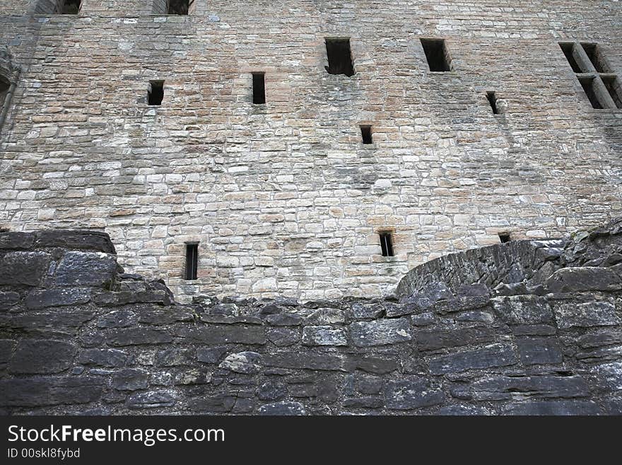 Wall detail of a fortified medieval building. Wall detail of a fortified medieval building.