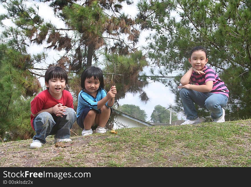 Happy Girls And Boy At The Park