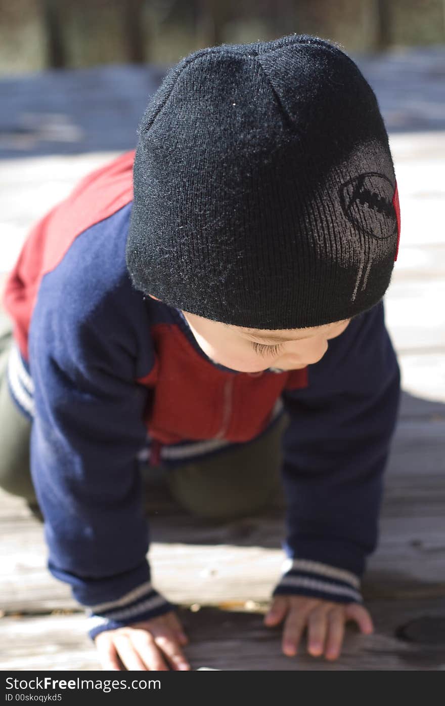 Picture of a cute baby boy crawling. Picture of a cute baby boy crawling