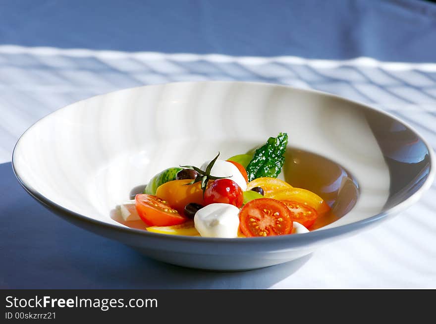 Image of tomato salad with buffalo mozzerella