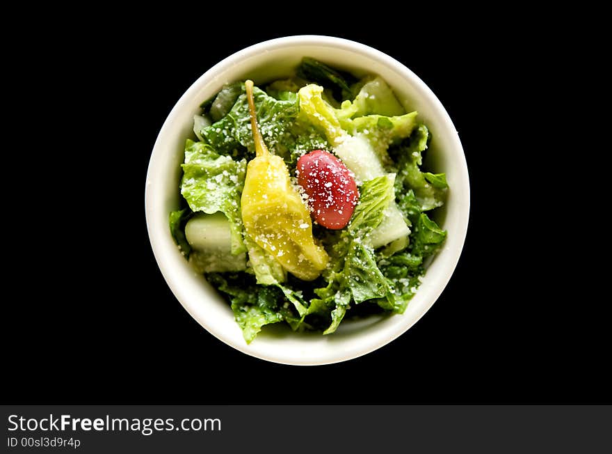 Image of italian salad topped with parmesean cheese