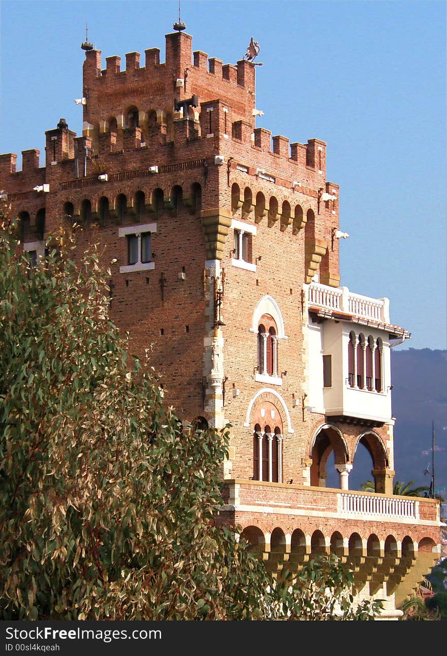 A beautiful example of castle close to the trees. A beautiful example of castle close to the trees.