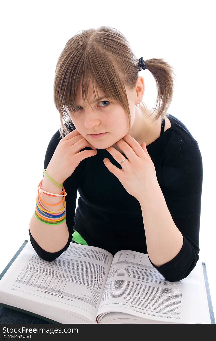 The young student with the book isolated on a white background