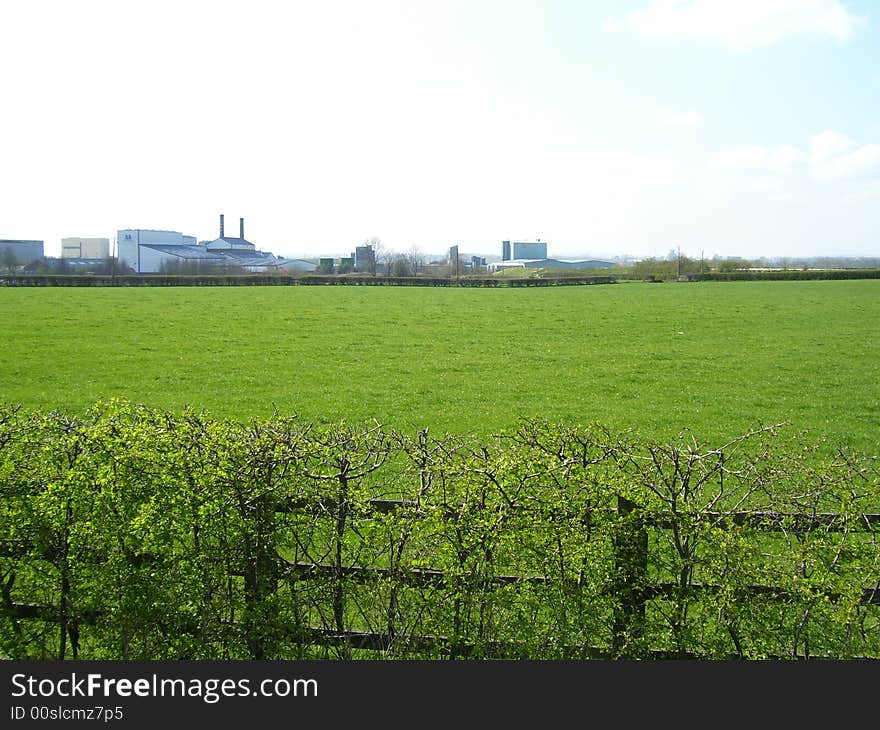 Industrial Town Viewed From Field