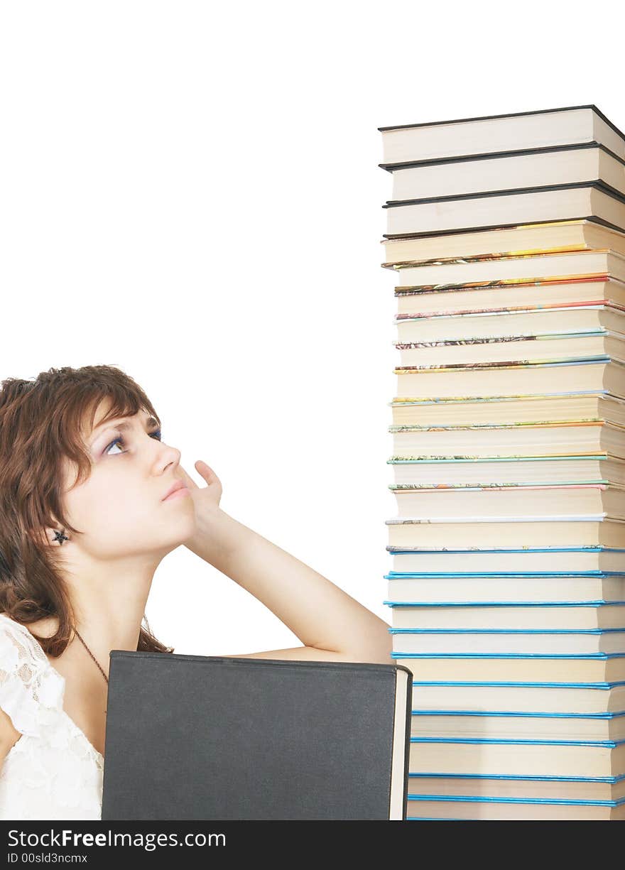 Schoolgirl with a pile of books. Schoolgirl with a pile of books