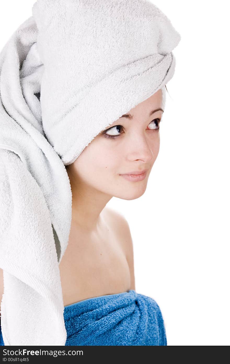 Young woman looking with a towel on her head. Young woman looking with a towel on her head