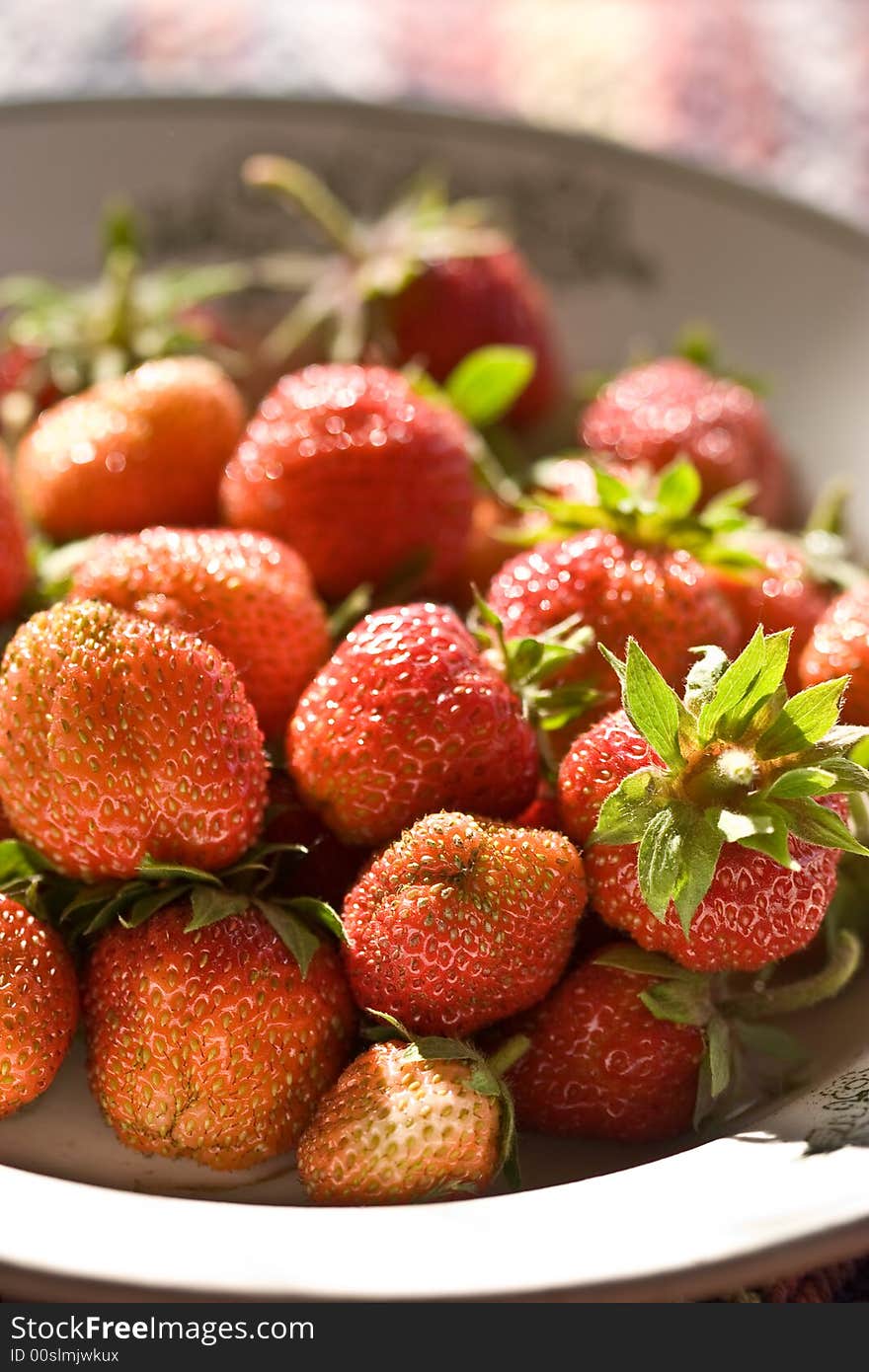 Food series: fresh ripe red strawberry on the plate