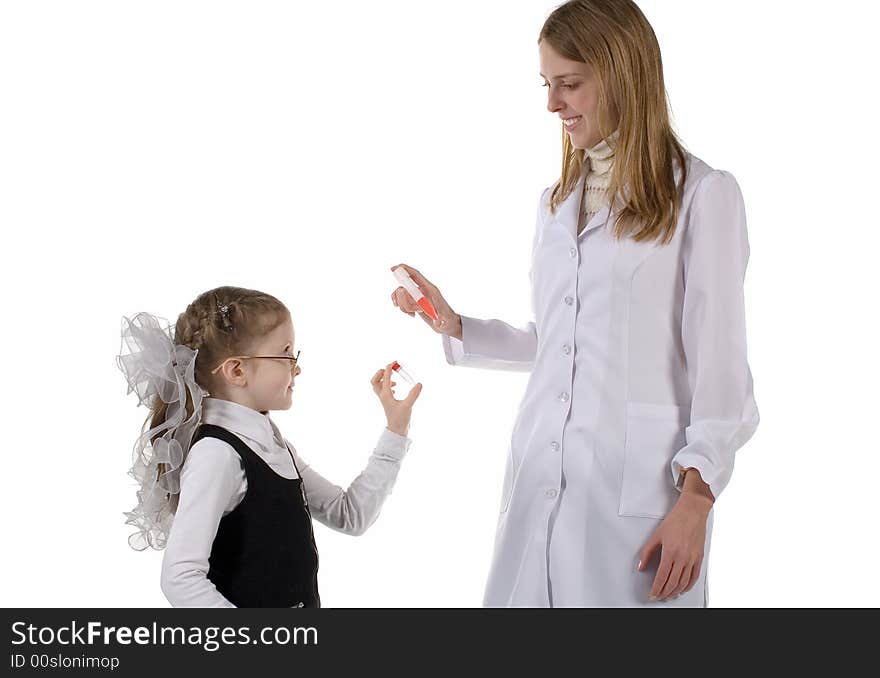 Two blondes play chemists. Isolated on white background. Two blondes play chemists. Isolated on white background