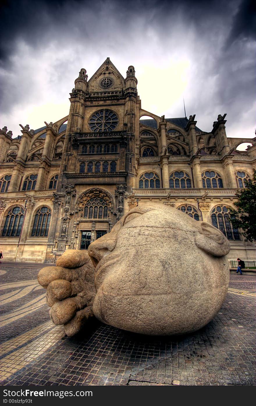 Old Building with a head and hand in front of it. Old Building with a head and hand in front of it.