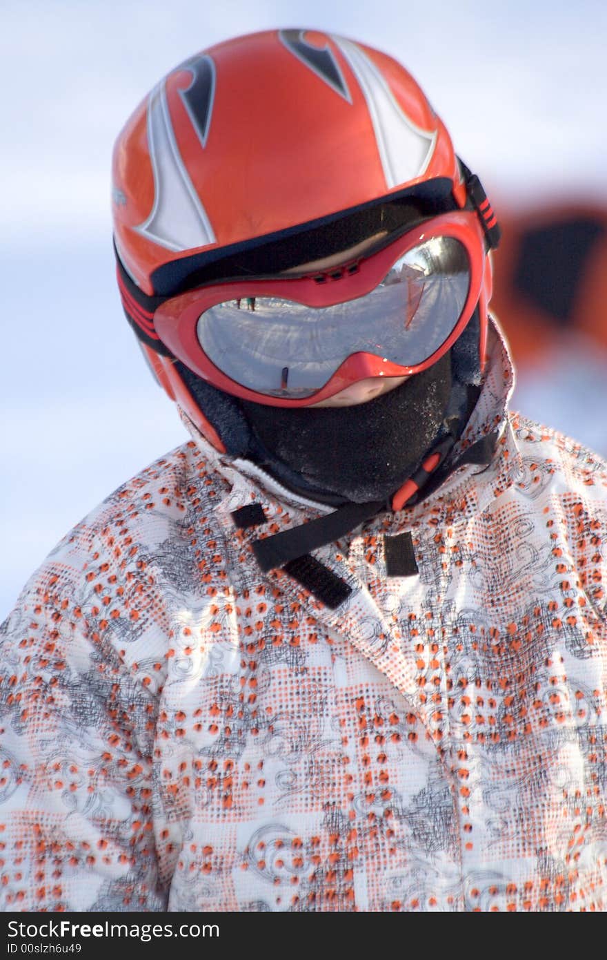 Man with helmet and glasses for mountain ski