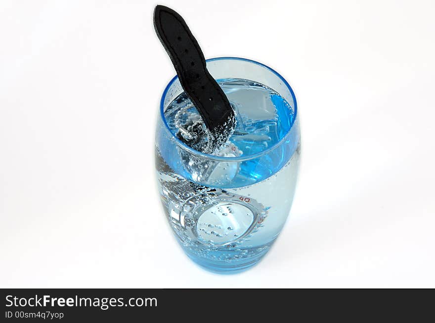 Waterproof watch in water glass full of water. Service test. Waterproof watch in water glass full of water. Service test.