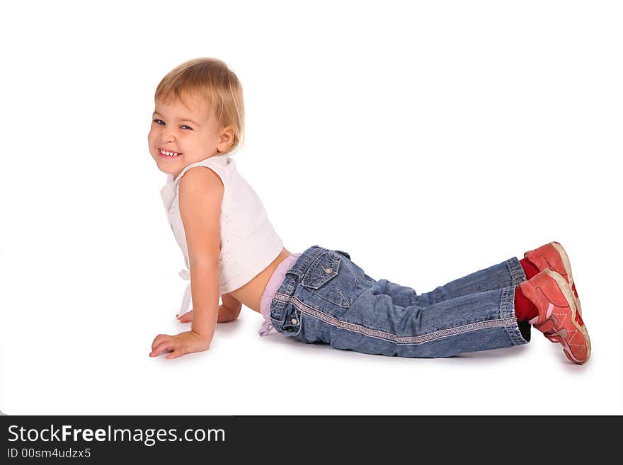 Little beautiful girl lie isolated on white