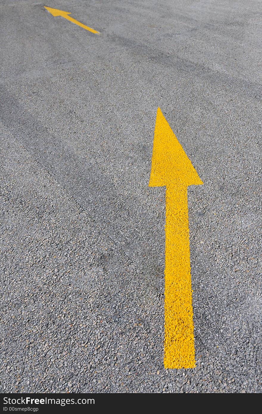 Arrow signs placed in the road. Arrow signs placed in the road