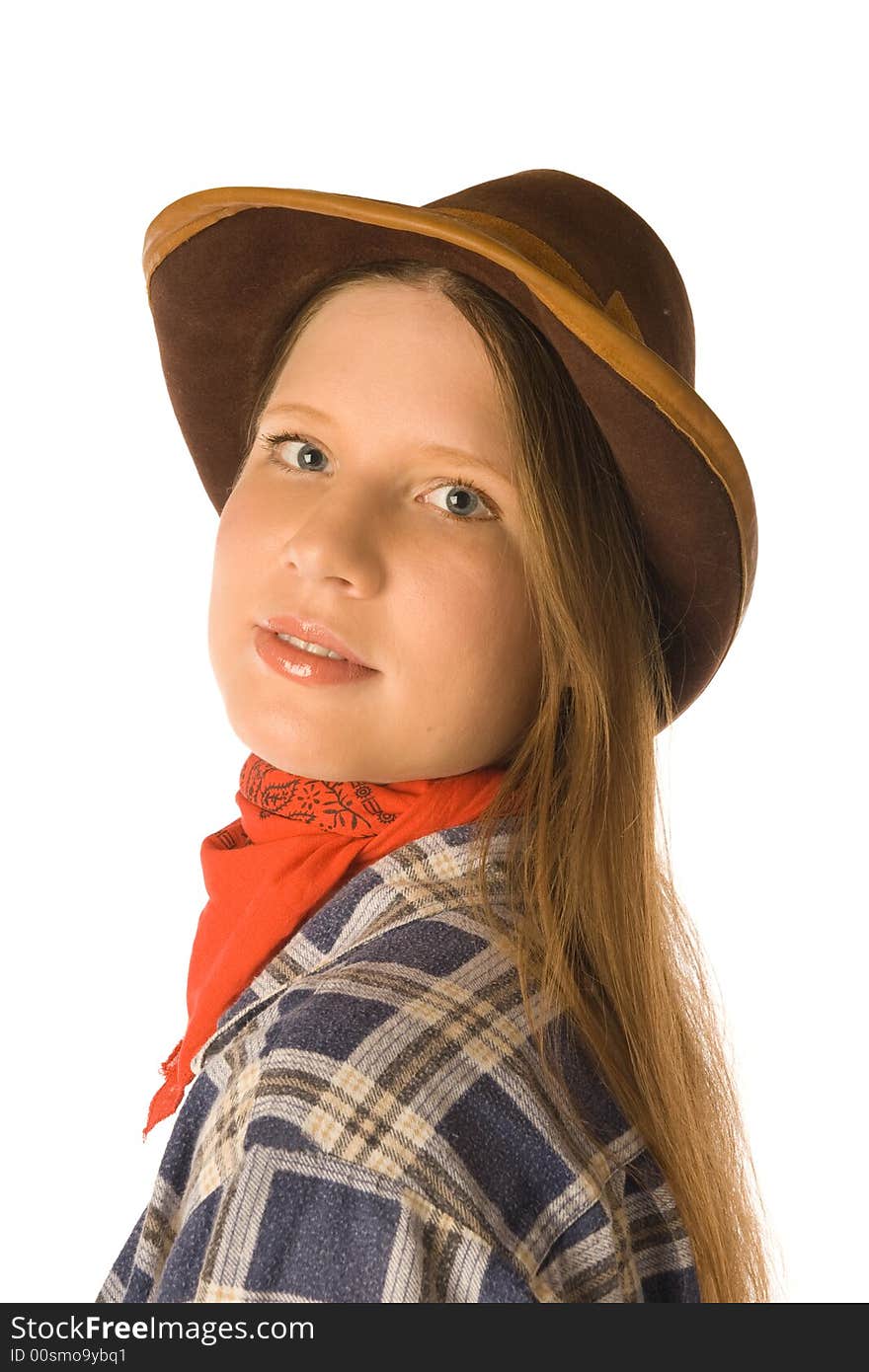 The portrait of a young woman wearing cowboy clothes. The portrait of a young woman wearing cowboy clothes