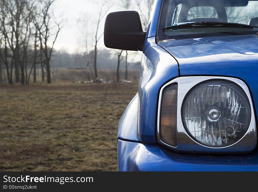 Blue car on the country