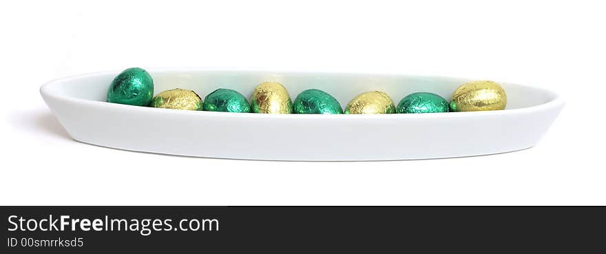 Bowl with green and gold easter eggs