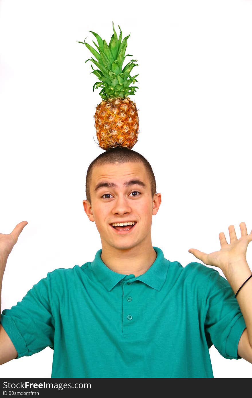 Boy with big orange-green pineapple. Boy with big orange-green pineapple