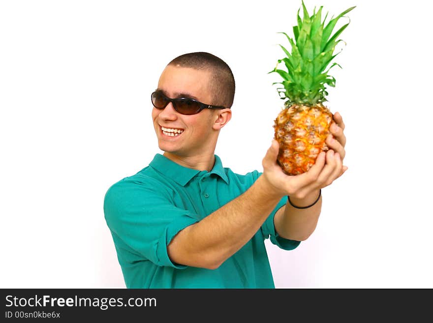 Boy with big orange-green pineapple. Boy with big orange-green pineapple