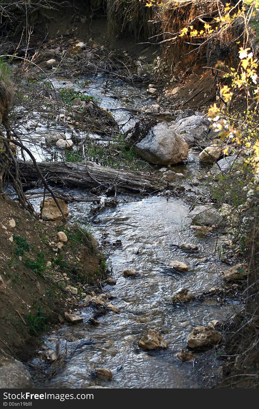 Stream of water falling downwards. Stream of water falling downwards