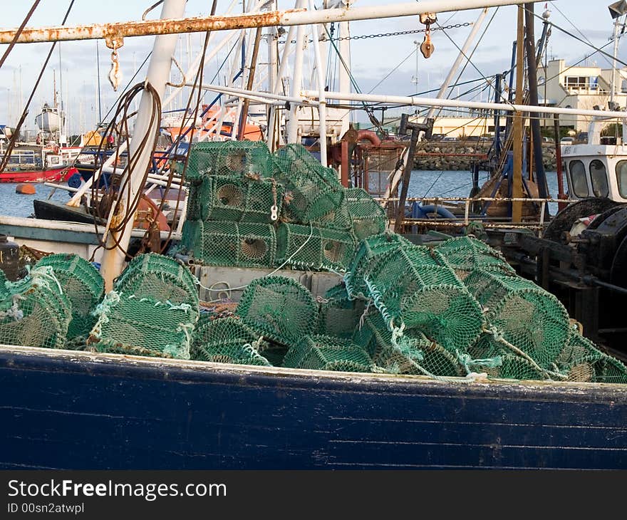 Crab pots stacked on a deck