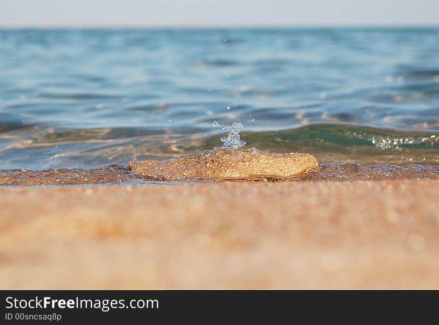 Splash water on the beach. Splash water on the beach