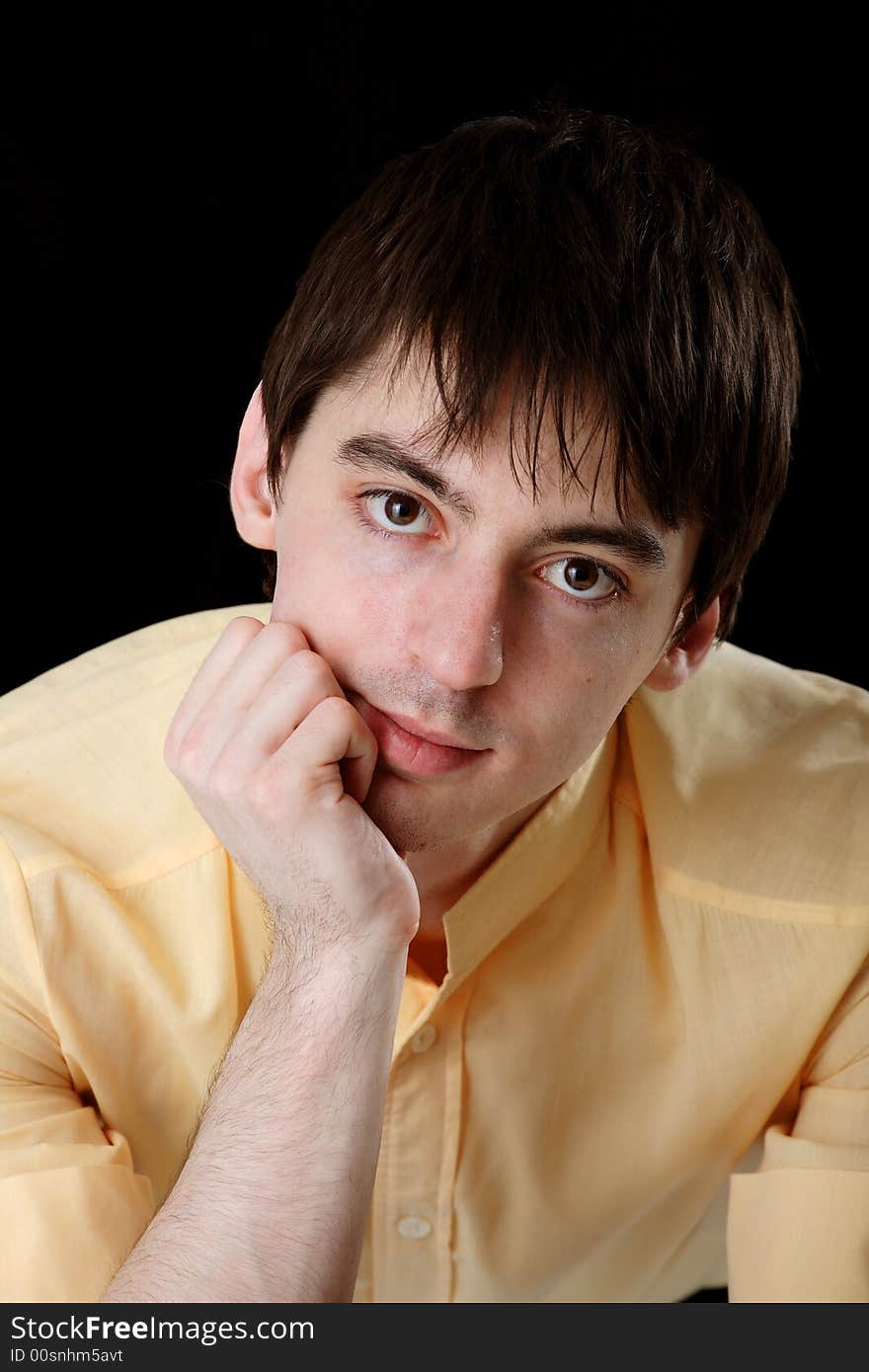 Young man in yellow shirt