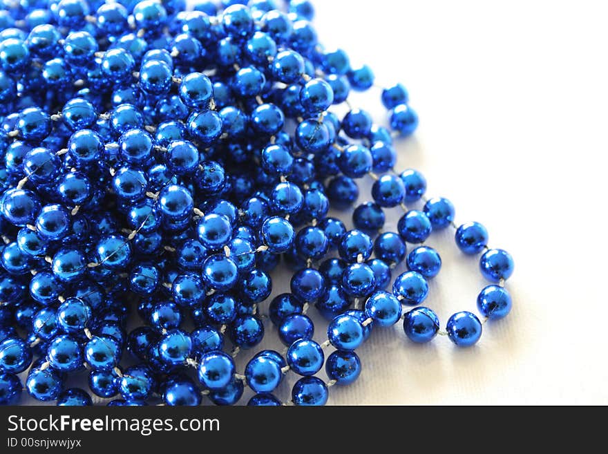 Blue bauble decorations on a white background. Blue bauble decorations on a white background