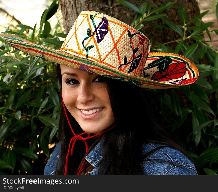 Girl modeling colorful sombrero