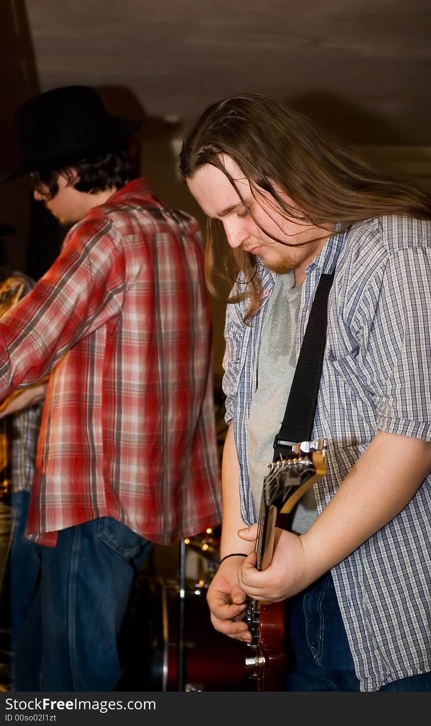 Two musicians on rehearsal.  Concert of group StockDog in club the Woman-ljuba. Rostov-on-Don. Russia