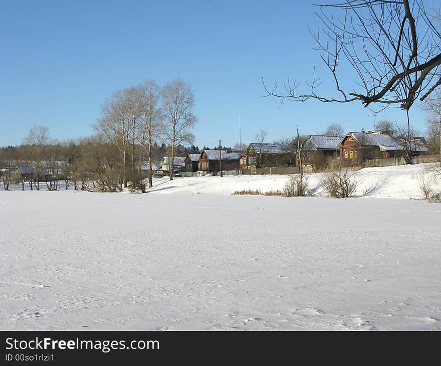 Small Village Near Frozen Lake