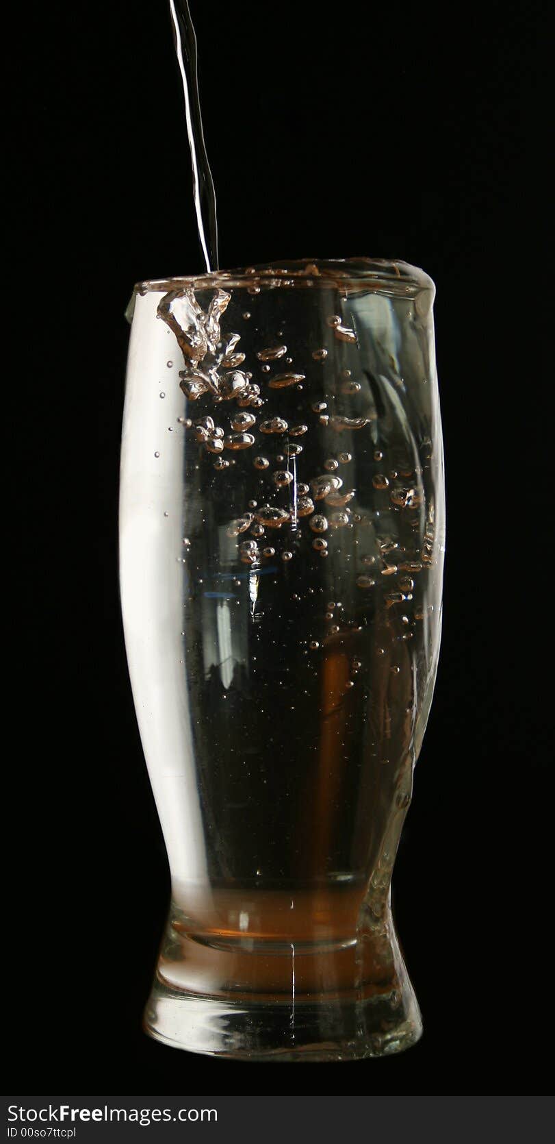 Glass of water on a black background. Glass of water on a black background