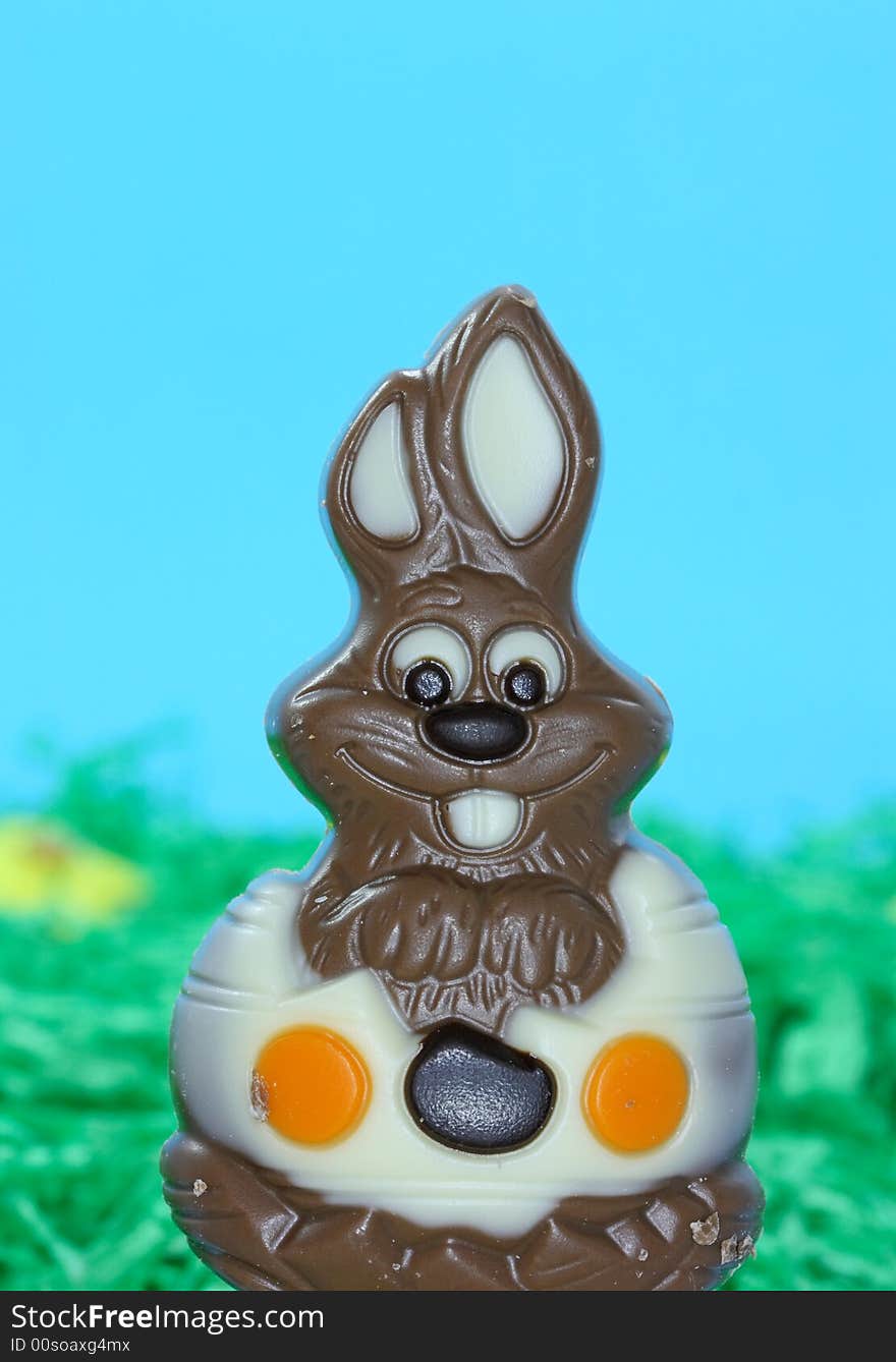 Chocolate easter bunny on blue