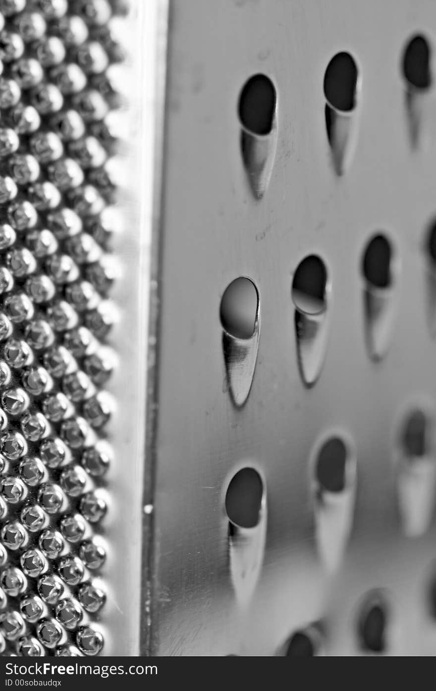 Macro view of stainless steel food grater. Macro view of stainless steel food grater