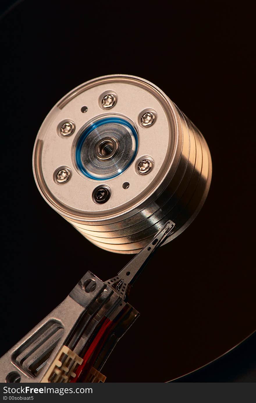 A close-up of a computer hard drive. A close-up of a computer hard drive.