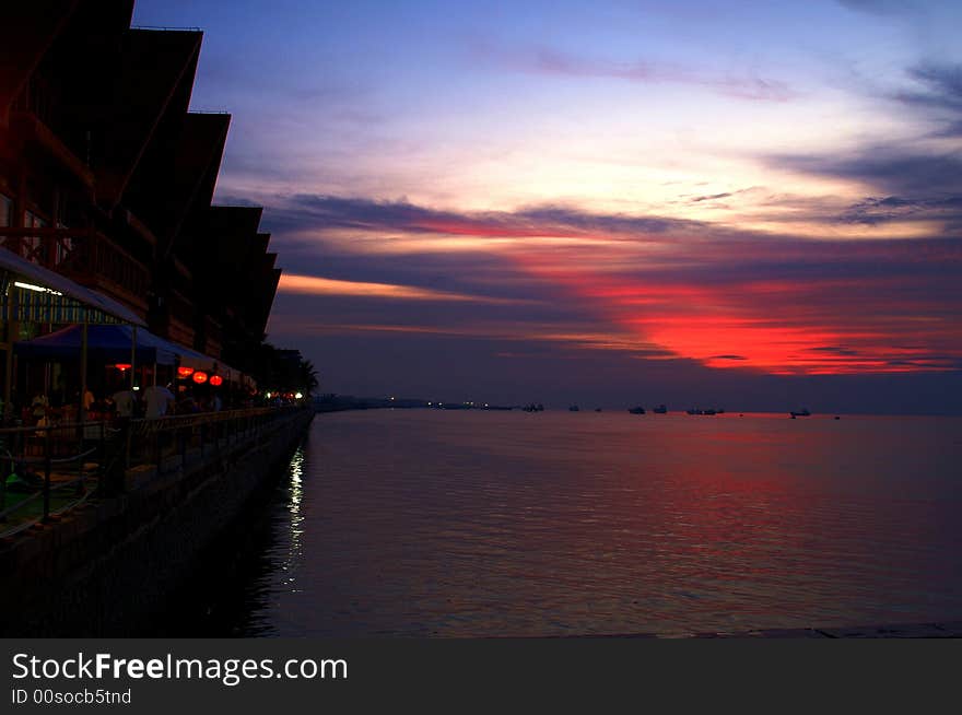 China chinese beihai yintan beach buildings sunset lights. China chinese beihai yintan beach buildings sunset lights