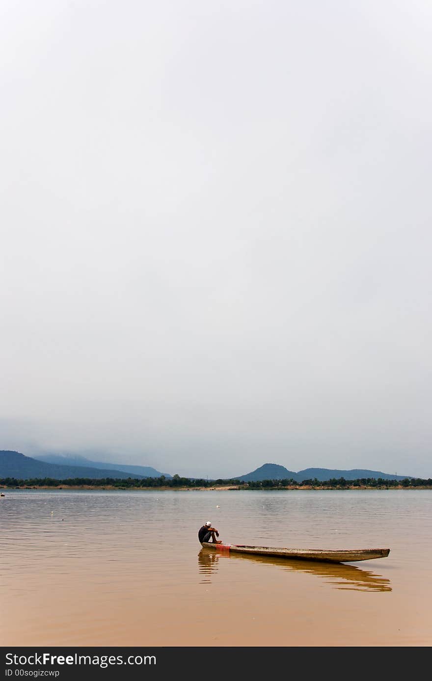 Mekong river boatmen on a canoe