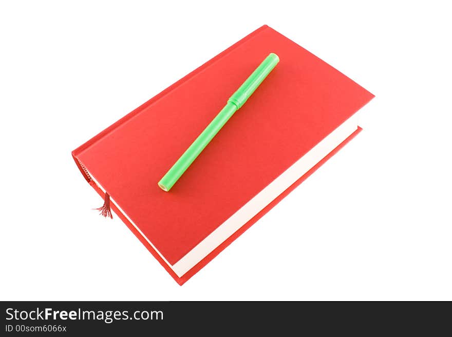 Red book and marker on a white background. Red book and marker on a white background