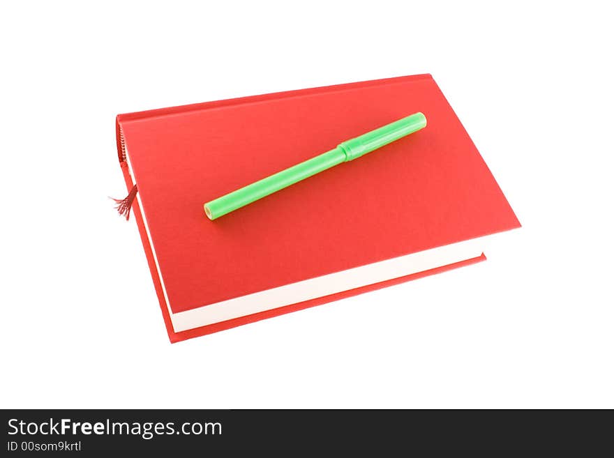 Red book and marker isolated on a white background