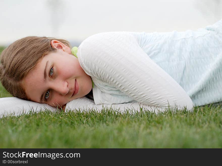 Young and happy girl is enjoying herself outdoors. Young and happy girl is enjoying herself outdoors