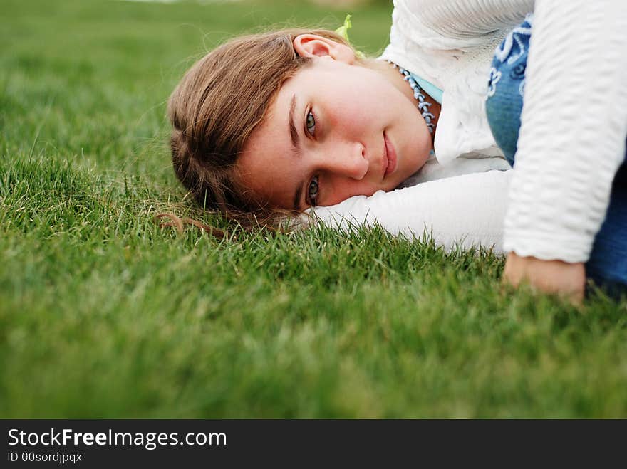 Young and happy girl is enjoying herself outdoors. Young and happy girl is enjoying herself outdoors