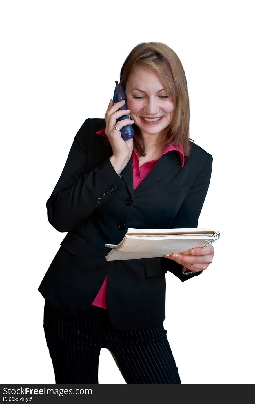 Business woman in a suit with a phone and notepad. Business woman in a suit with a phone and notepad