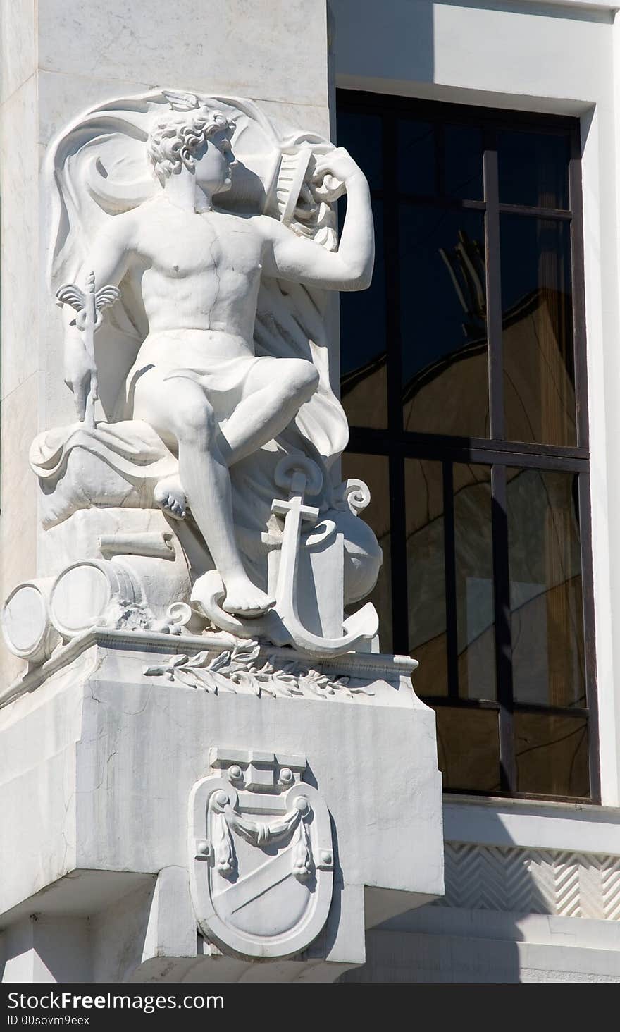 Man statue made of white stone