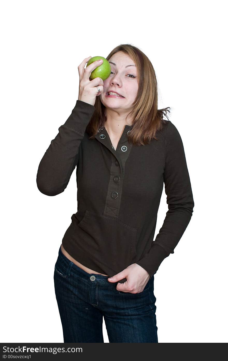 Woman about to enjoy a bright green apple. Woman about to enjoy a bright green apple