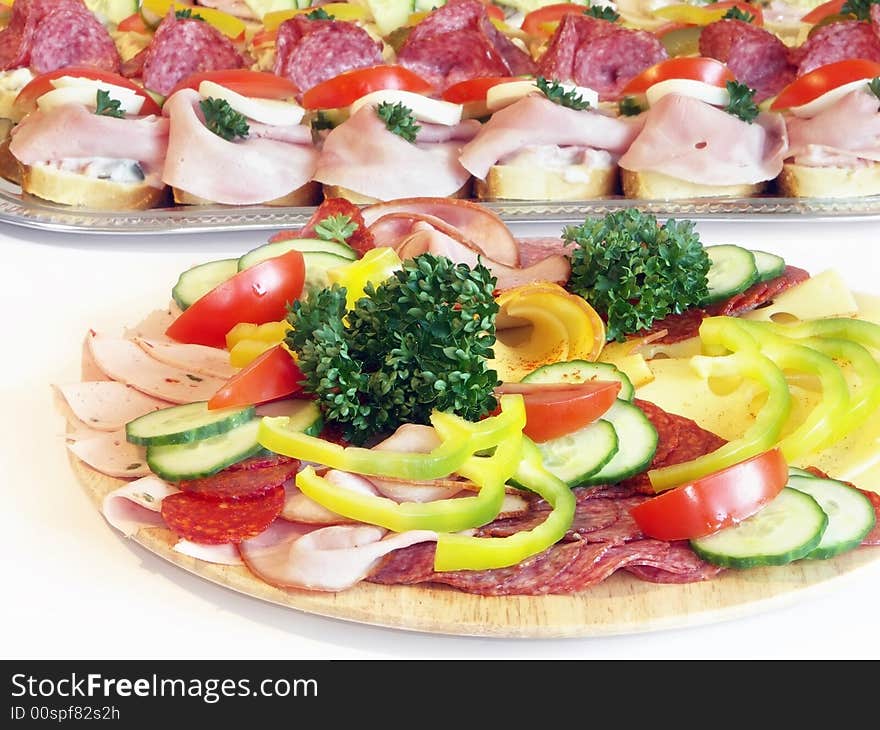 Cold food - salami and fresh vegetables served on plate